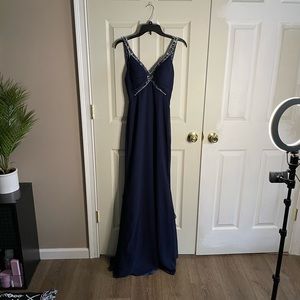 Prom dress-size 6 navy blue with beaded detailing in the front & back w/ ruffles